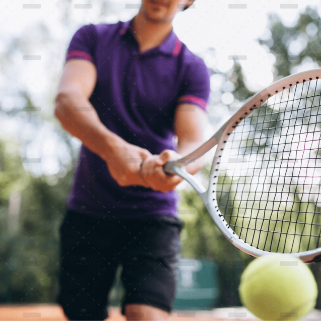 demo-attachment-26-young-man-tennis-player-court-tennis-racket-close-up3